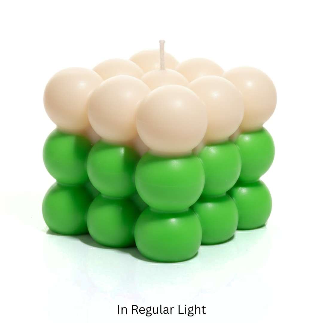 Bubble Candle made of green and beige on a white background.
Sensations Unleashed BDSM Glow in the Dark + UV Wax Play Big Bubble Candle In India (Double Colour)