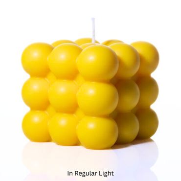 Yellow bubble candle on a white background
Sensations Unleashed BDSM UV Wax Play Big Bubble Candle In India