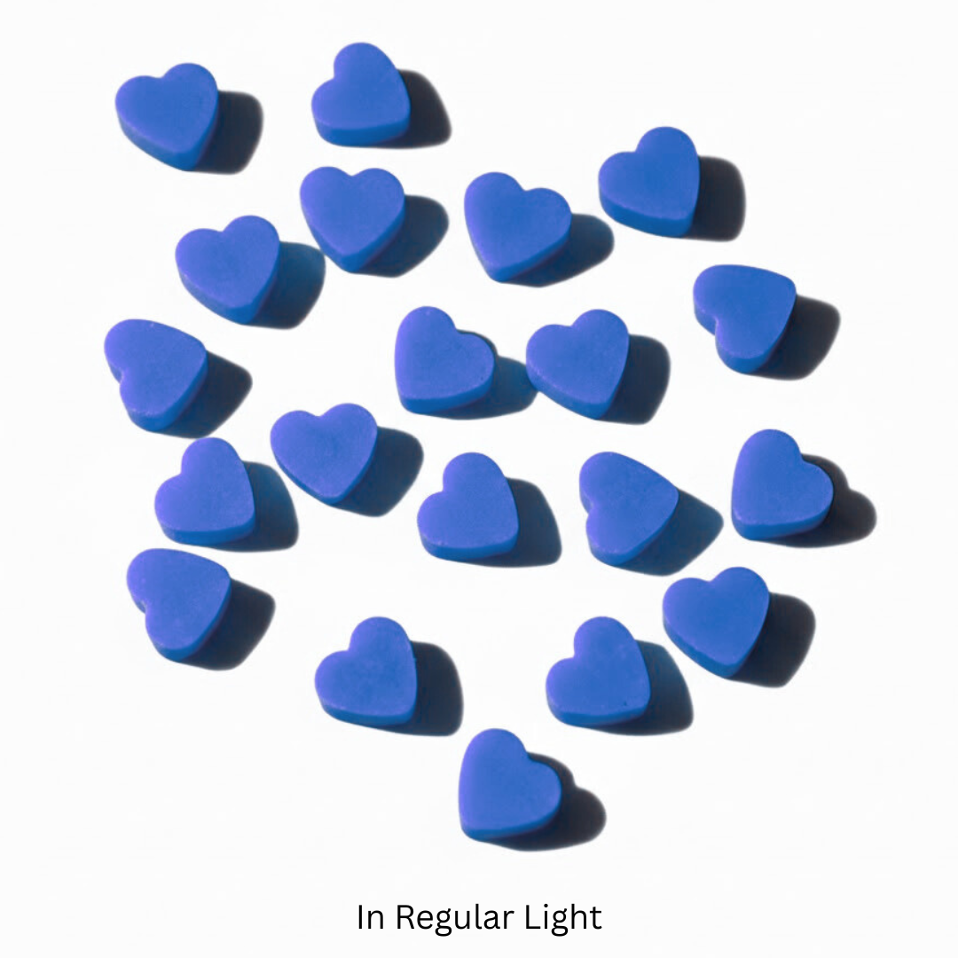 Blue heart-shaped wax melts on a white background

Sensations Unleashed BDSM Non UV Wax Play Candle Melts In India - Set of 20 Pellets