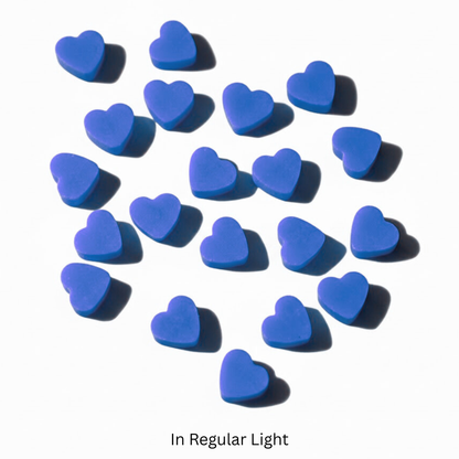 Blue heart-shaped wax melts on a white background

Sensations Unleashed BDSM Non UV Wax Play Candle Melts In India - Set of 20 Pellets