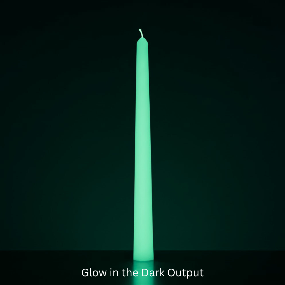 Glowing green candle against a black background with text 'Glow in the Dark Output'. Sensations Unleashed BDSM Glow in the Dark Wax Play Tapered Candle In India