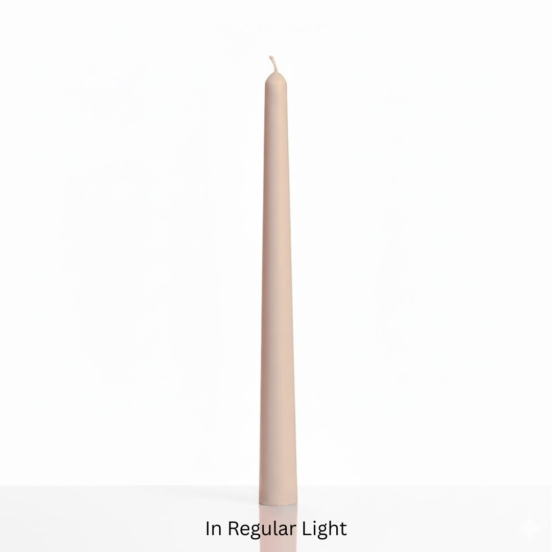 Beige candle on a white background with text 'In Regular Light'. Sensations Unleashed BDSM Glow in the Dark Wax Play Tapered Candle In India